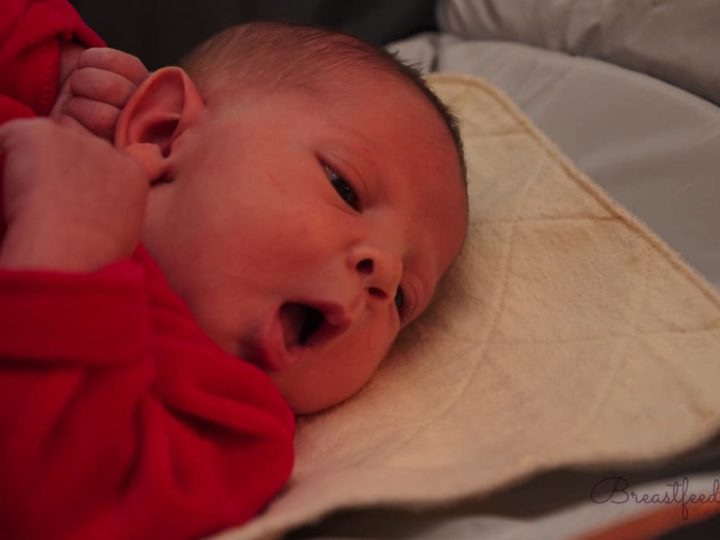 Newborn baby on changing table