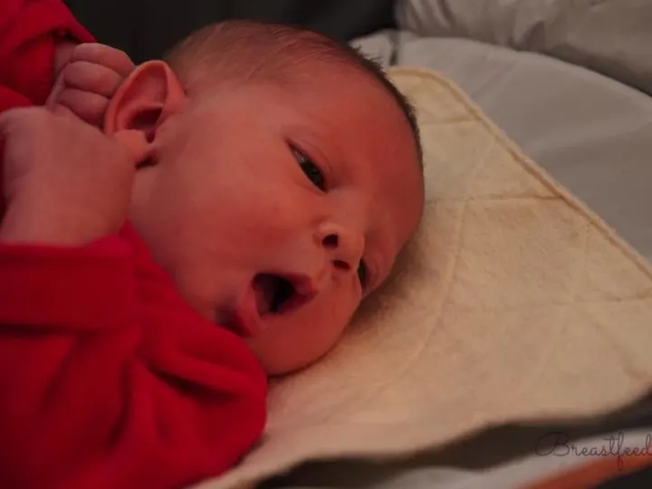 Newborn baby on changing table